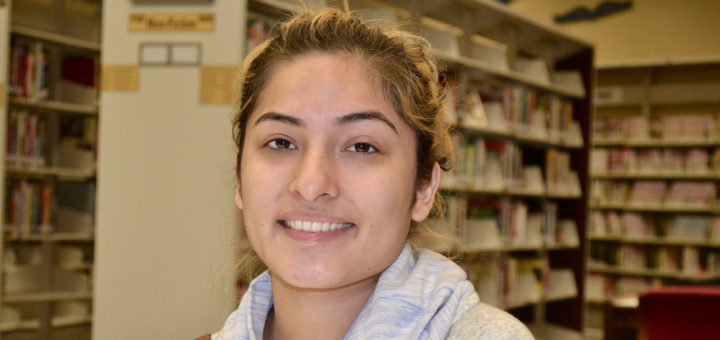 Jennifer Hernandez smiling in library