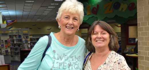 Joan Ickes and Sandra Tilton at the library