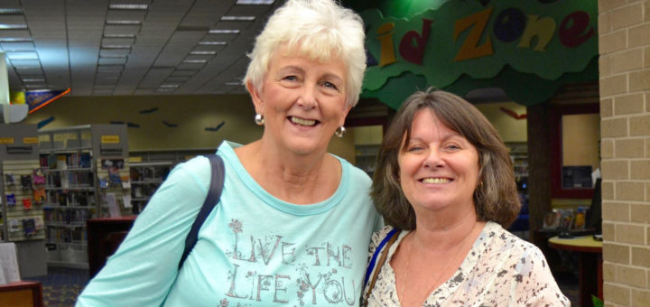 Joan Ickes and Sandra Tilton at the library