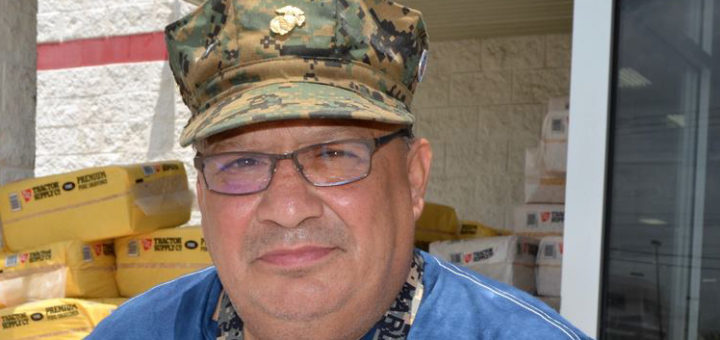 Lionel Ayala stands outside store