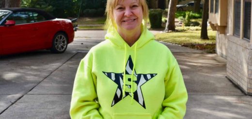 Marie Butler stands in her driveway