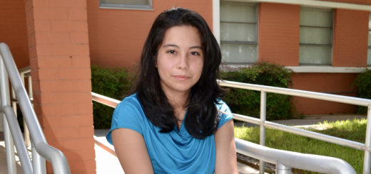 Monica Gutierrez sitting on Lee College campus