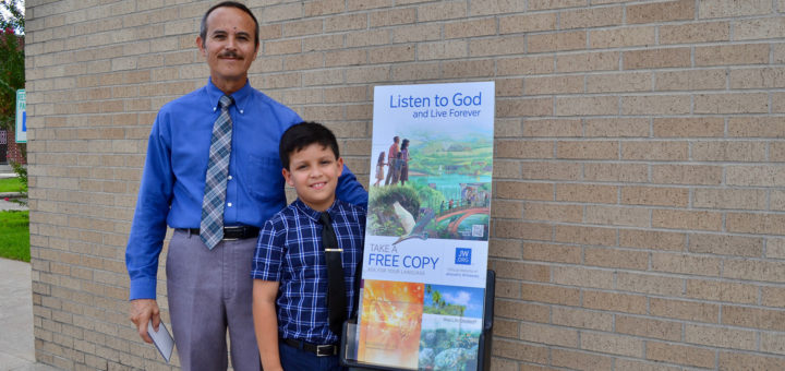 Nick Ayala and friend, Albert, stand outside the post office
