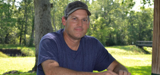 Owen Shipp sits at picnic table