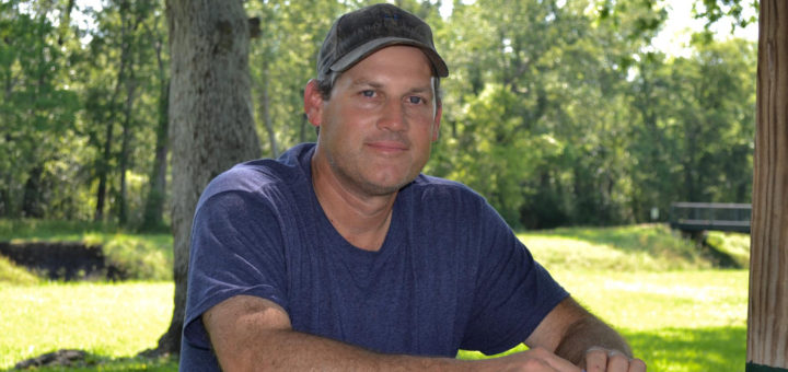 Owen Shipp sits at picnic table