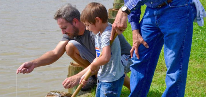 Pat O'Bryant crabbing with his son and grandson