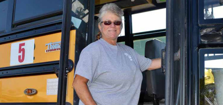 Theresa Cain on school bus steps