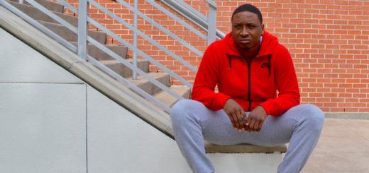 Tim Coleman sitting on steps