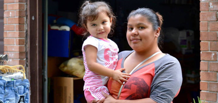 Adriana Lemus holds her daughter