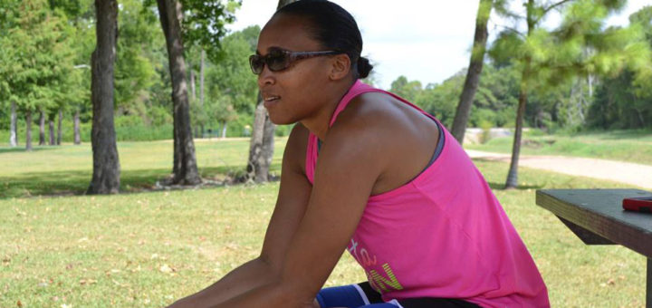 Audria Courtney sits on park bench