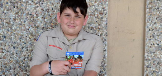 Boy Scout selling coupon books