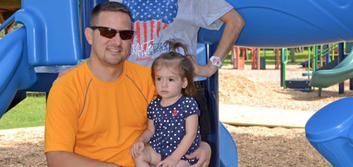 Adriana and Brandon Martindale with their daughter
