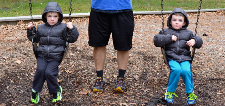 Brett Hilsmeier with his twin grandsons at the park