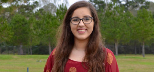 Candice Flores standing at the dog park