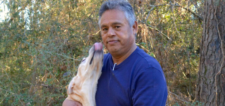Carmen Lopez with his dog at the park