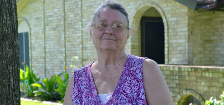 Carol Rhodes in her yard