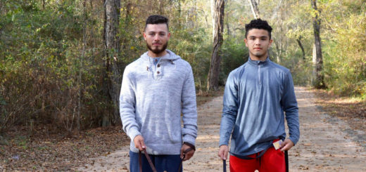 Cesar and Ivan Lagunas with their dogs at the park