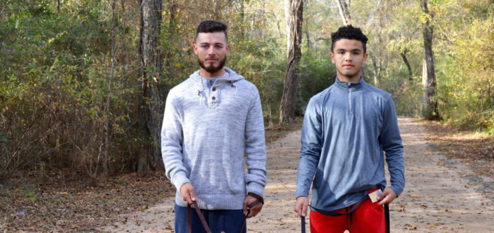 Cesar and Ivan Lagunas with their dogs at the park