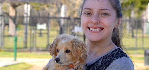 Cheyenne Garza holds her dog
