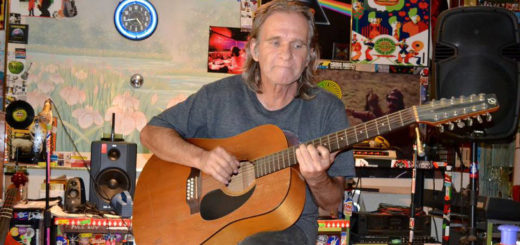 Chris Cloud playing the guitar