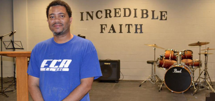 Christopher Baker inside his church