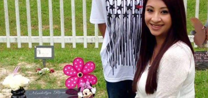 Crystal Ortiz at grave of her daughter