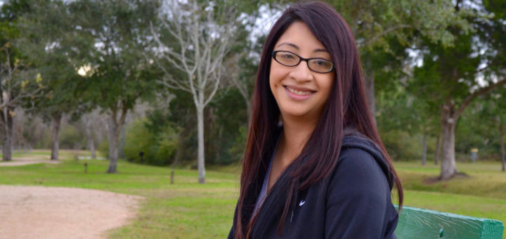 Crystal Ortiz sits on park bench