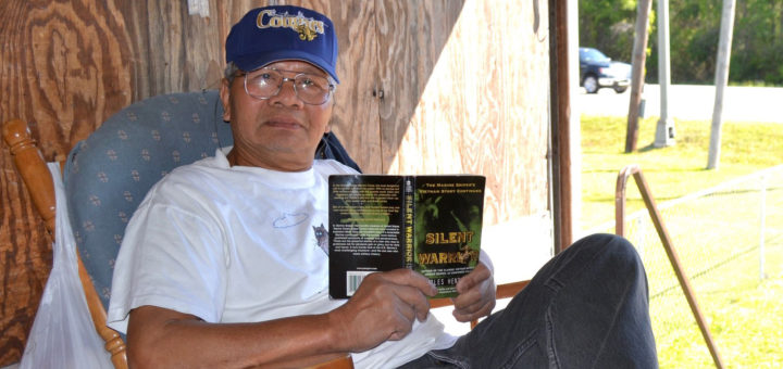 Cuong Truong reads a book
