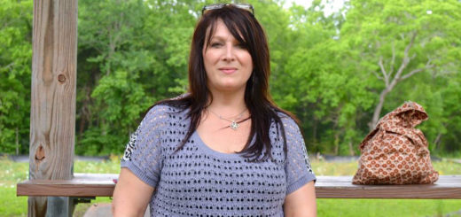 Darlene Cornick sits at picnic table