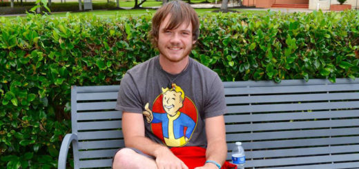 Engineering student sits on a bench