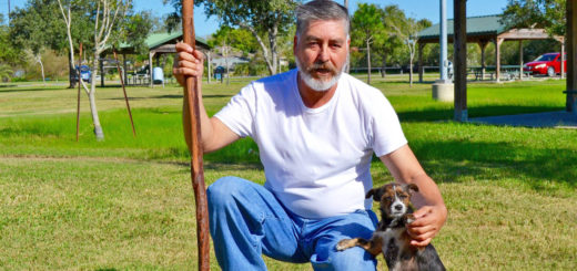 Enrique Bustamante and his dog at the park