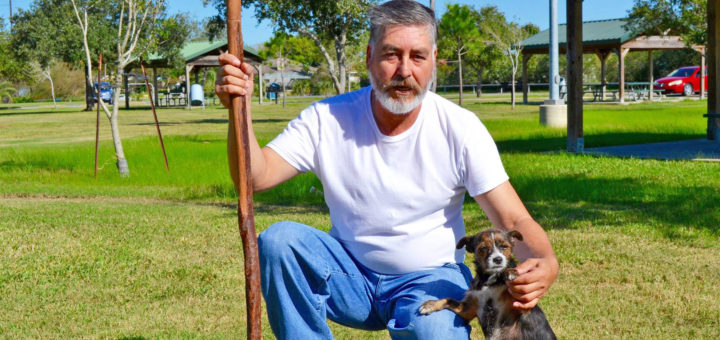Enrique Bustamante and his dog at the park