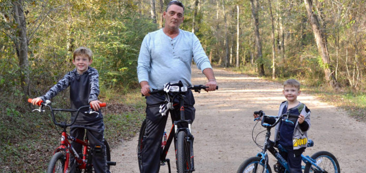 Eric Bush rides bikes with his grandsons