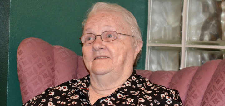 Frankie Johnson sits in a chair