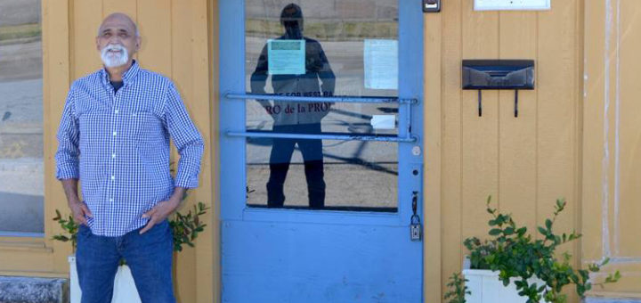 Fred Aguilar stands in front of Promise Center