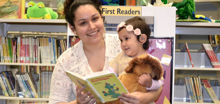 Genesis Torres with her daughter at library