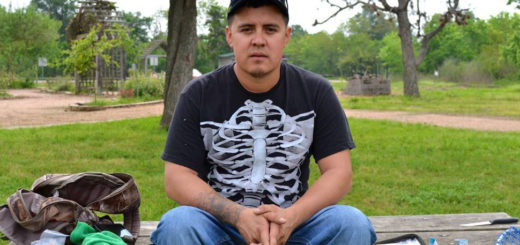 Gilbert sits on picnic table at park