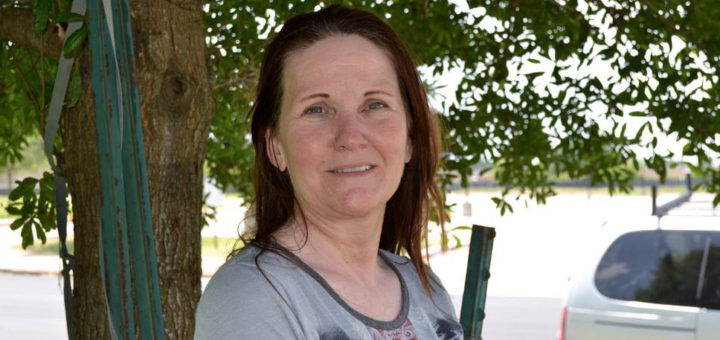 Jennifer Hinkle in her front yard