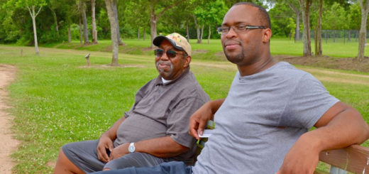 Men sitting on park bench