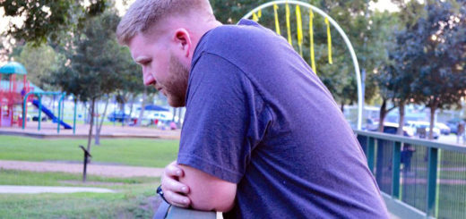 Kodi Reed on a bridge at the park
