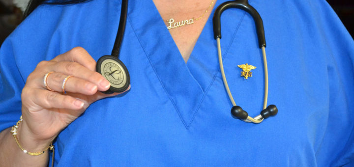 Laura Rupp wearing nurses uniform