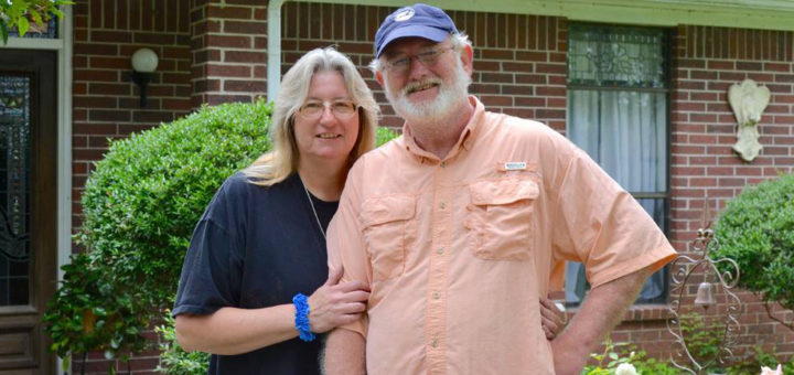 Liz and Gary Erwin in their yard