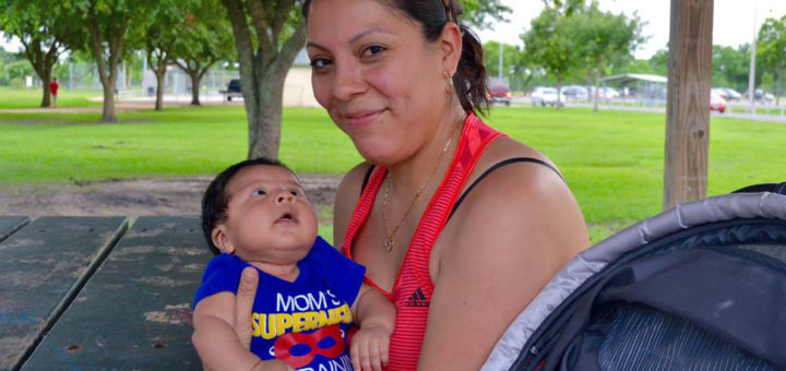 Luci Gonzalez holds her son