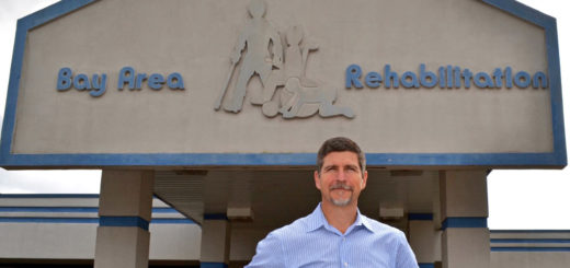 Mark Alexander in front of Bay Area Rehabilitation Center