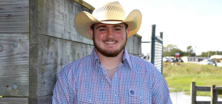 Micah Cheatham wears cowboy hat