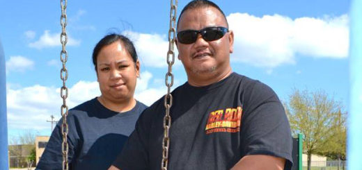 Michael Dube with his wife and daughter