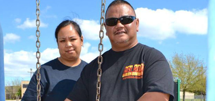 Michael Dube with his wife and daughter