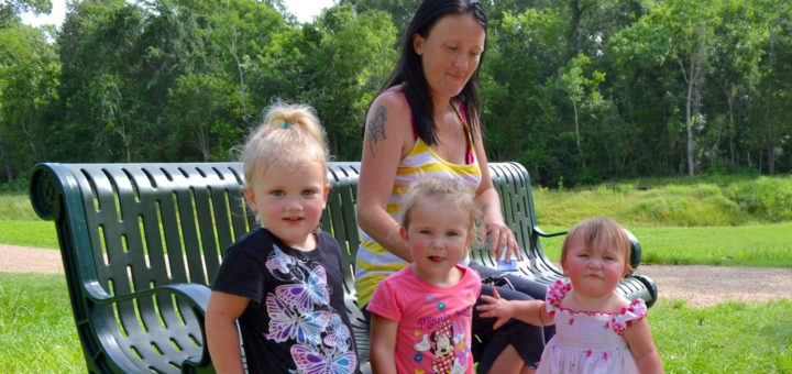 Mom with three daughters at park