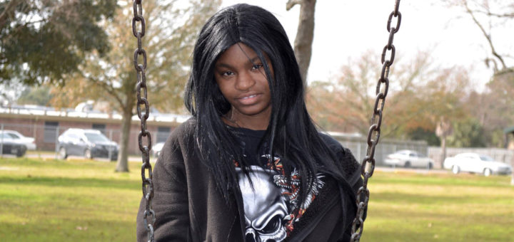 Nicole Freeman on a swing