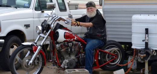 Randy Evans sits on his motorcycle